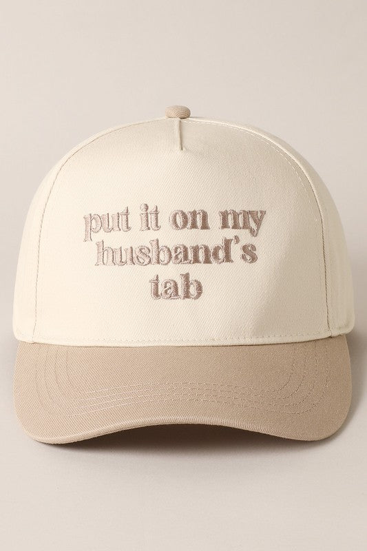 Put it on my husband’s tab hat