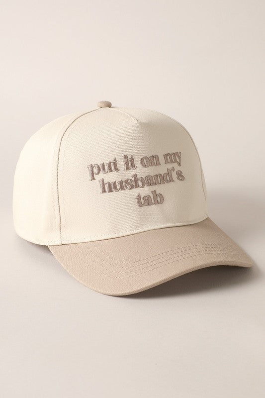 Put it on my husband’s tab hat