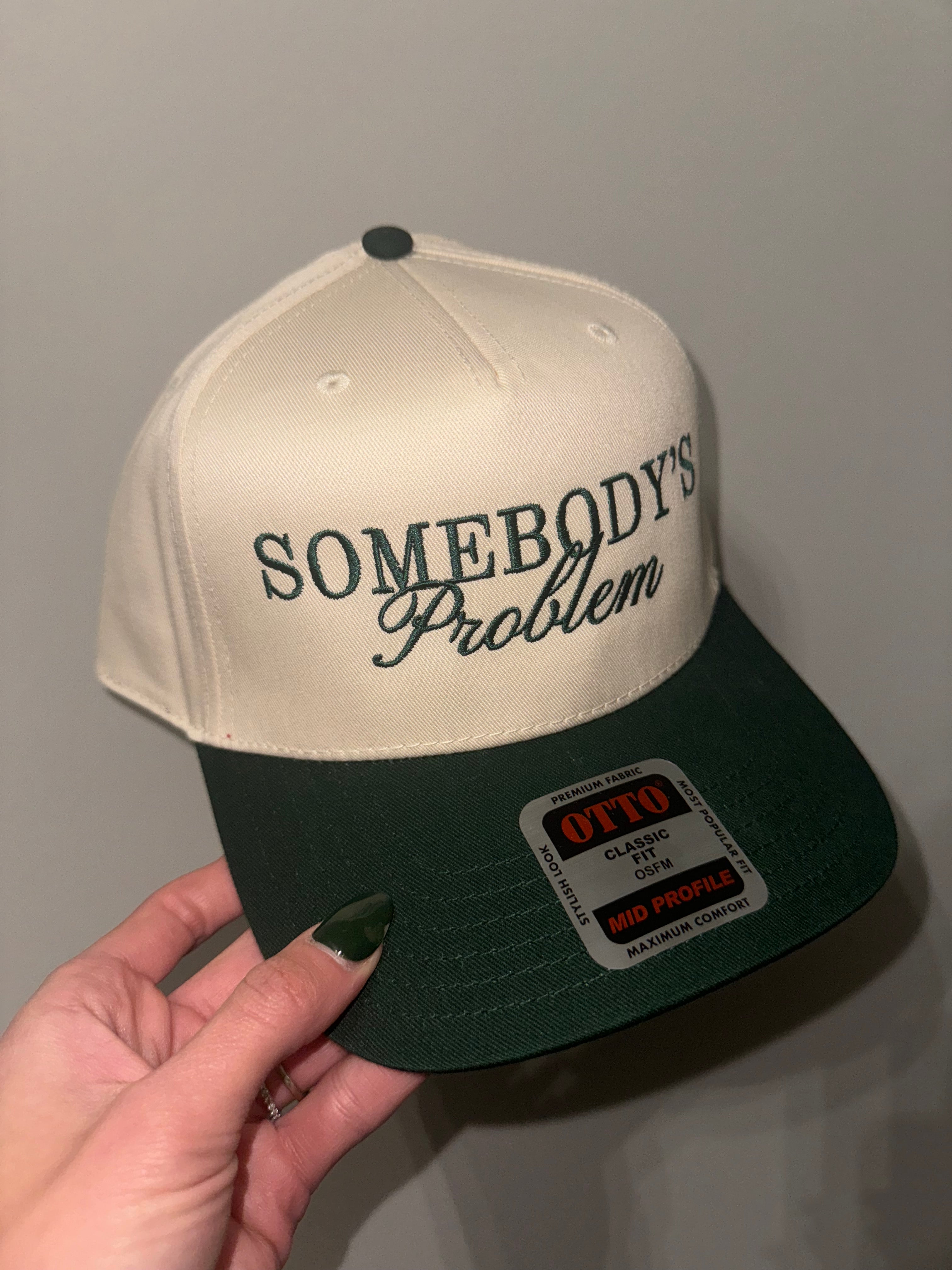 Somebody’s Problem Trucker Hat