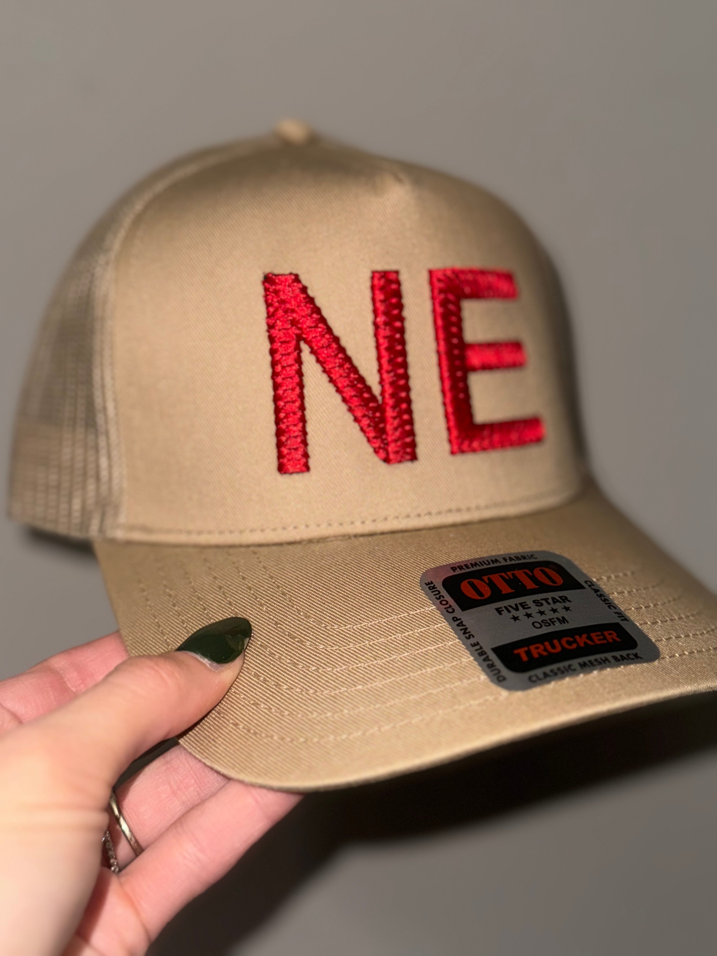 NE Puff Embroidered Trucker Hat